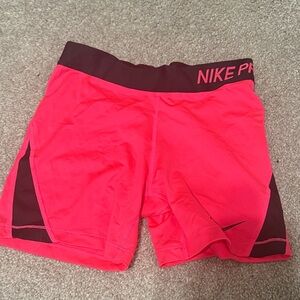 Nike Pro Women's Bright Pink Bike Shorts with Black Accents